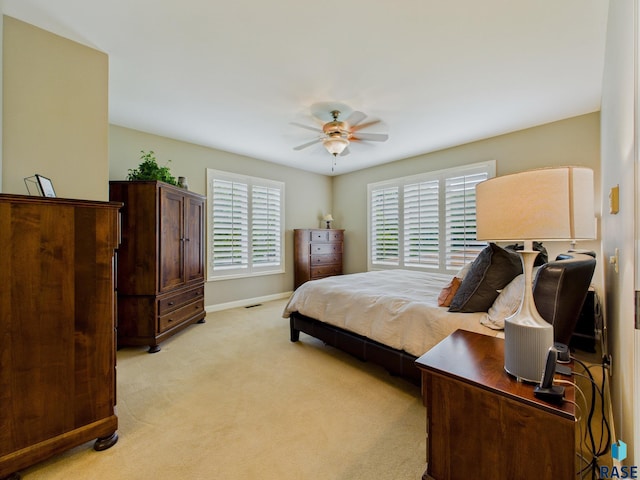 18 S Elkjer Cir, Sioux Falls, SD 57103 - bedroom featuring light carpet and a ceiling fan
