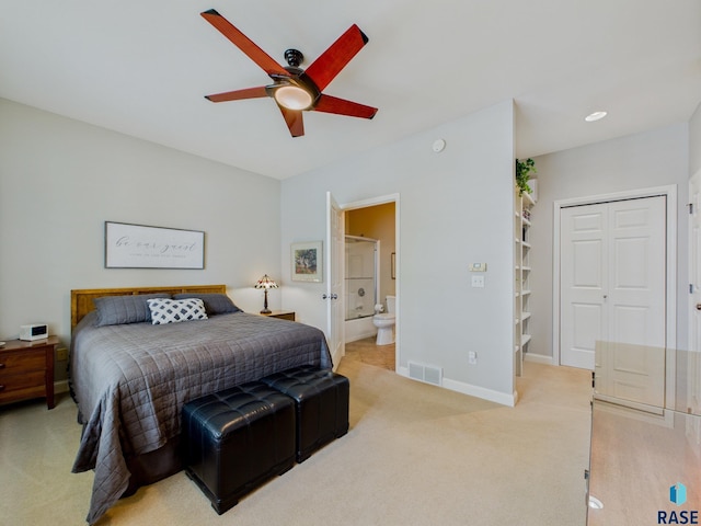 18 S Elkjer Cir, Sioux Falls, SD 57103 - bedroom with light carpet, a ceiling fan, and ensuite bath