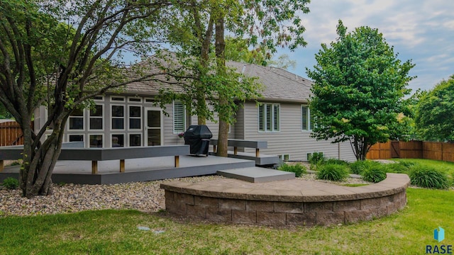 18 S Elkjer Cir, Sioux Falls, SD 57103 - rear view of property featuring a wooden deck