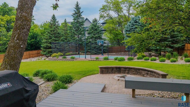 18 S Elkjer Cir, Sioux Falls, SD 57103 - view of yard featuring basketball court