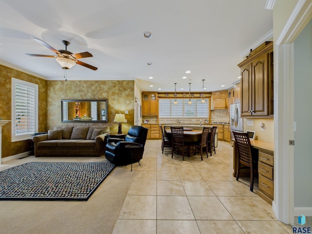 18 S Elkjer Cir, Sioux Falls, SD 57103 - living area with a ceiling fan, crown molding, light tile patterned floors, and recessed lighting