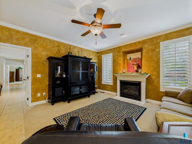 18 S Elkjer Cir, Sioux Falls, SD 57103 - living area featuring healthy amount of natural light, ceiling fan, crown molding, and a fireplace with flush hearth
