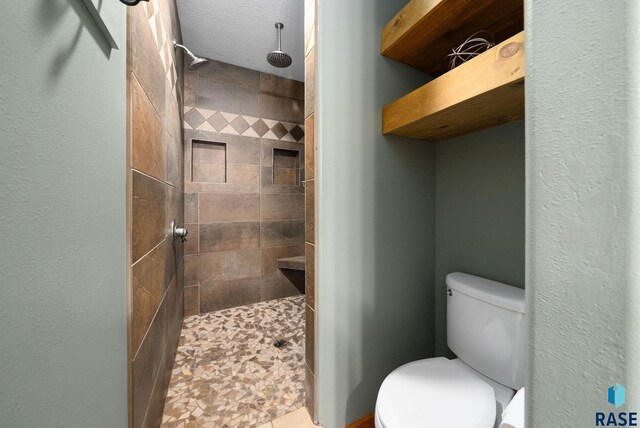 212 N Fairway Dr, Brandon, SD 57005 - full bathroom with a tile shower and toilet