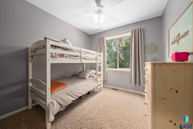 212 N Fairway Dr, Brandon, SD 57005 - carpeted bedroom with baseboards and ceiling fan