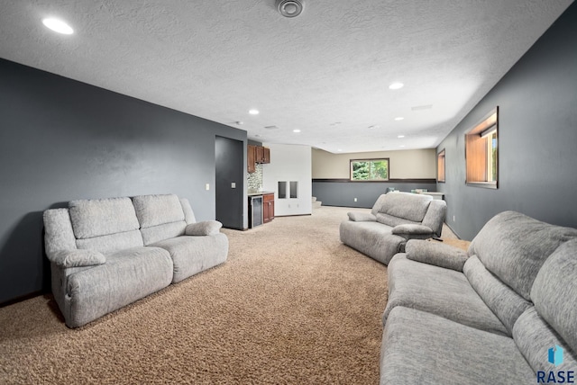 212 N Fairway Dr, Brandon, SD 57005 - living room featuring carpet, recessed lighting, wine cooler, and a textured ceiling