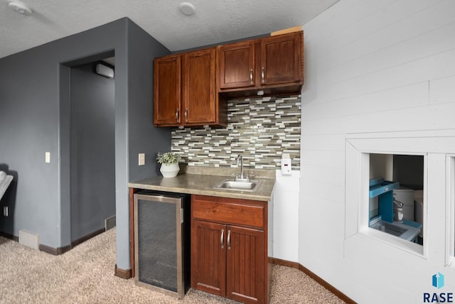212 N Fairway Dr, Brandon, SD 57005 - indoor wet bar with beverage cooler, backsplash, and light colored carpet