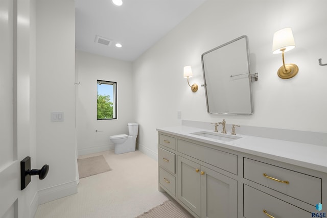 1617 S Scarlet Oak Pl, Sioux Falls, SD 57110 - bathroom featuring vanity and recessed lighting