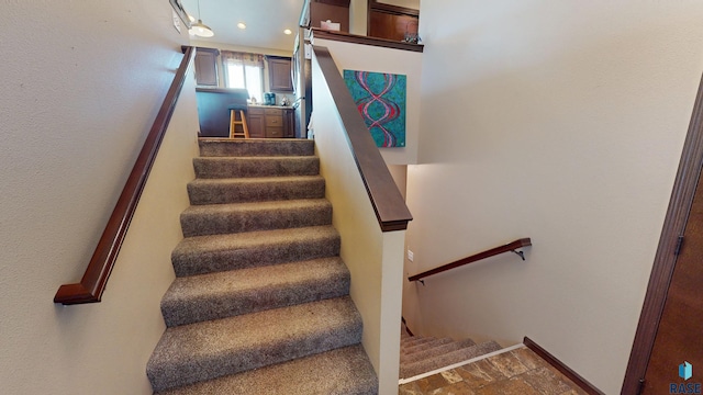 210 Lindsay Dr, Aurora, SD 57002 - stairway with recessed lighting