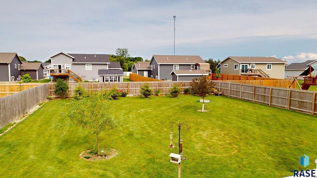 210 Lindsay Dr, Aurora, SD 57002 - fenced backyard with a residential view
