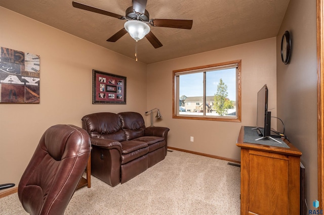 3121 S Dubuque Ave, Sioux Falls, SD 57110 - carpeted living area with baseboards and ceiling fan