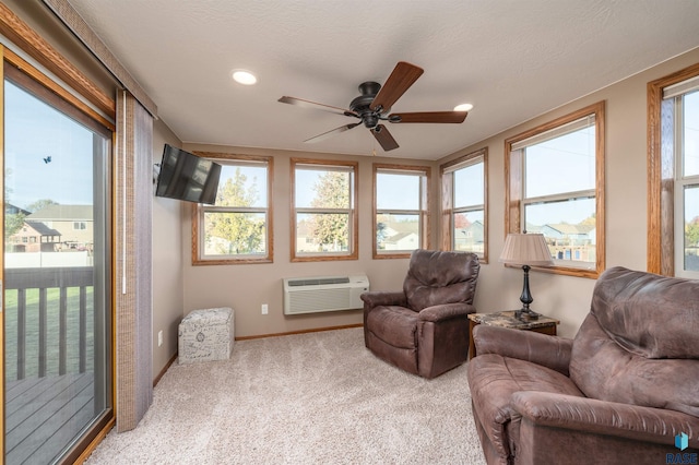 3121 S Dubuque Ave, Sioux Falls, SD 57110 - living area with carpet, a ceiling fan, a wall mounted air conditioner, and recessed lighting