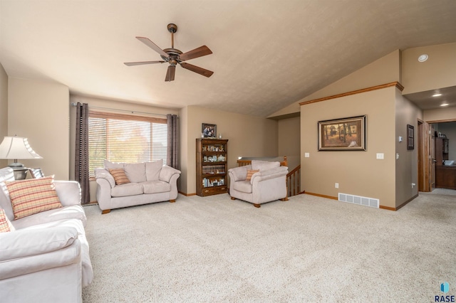 3121 S Dubuque Ave, Sioux Falls, SD 57110 - living area with a ceiling fan, vaulted ceiling, and carpet floors