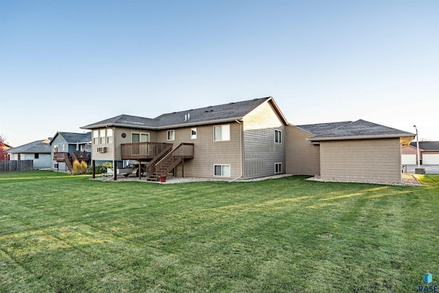 3121 S Dubuque Ave, Sioux Falls, SD 57110 - rear view of property with stairway, a deck, and a yard