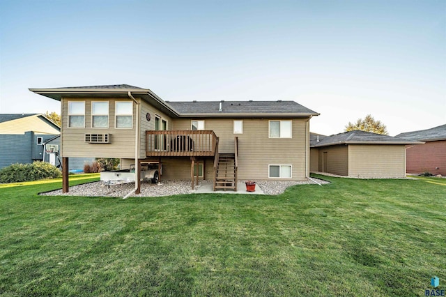 3121 S Dubuque Ave, Sioux Falls, SD 57110 - back of property with a wooden deck, a lawn, and stairs