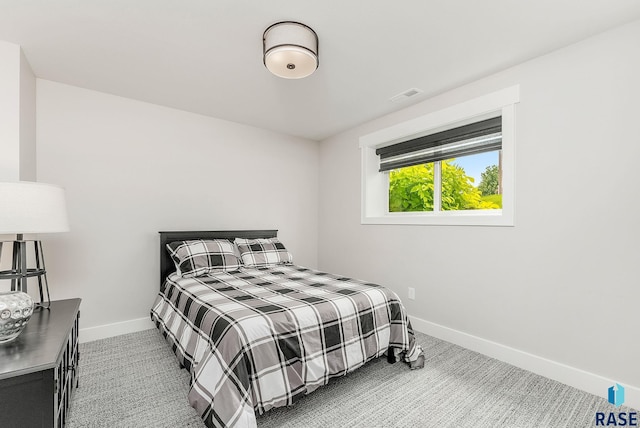 512 E 77th St, Sioux Falls, SD 57108 - carpeted bedroom featuring baseboards