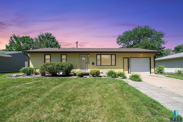 1305 S Bruce Rd, Sioux Falls, SD 57105 - single story home featuring an attached garage, concrete driveway, and a front yard
