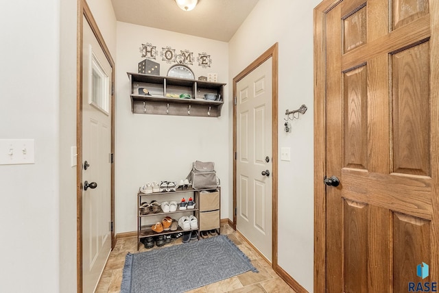 4005 S Grand Slam Ave, Sioux Falls, SD 57110 - mudroom with baseboards