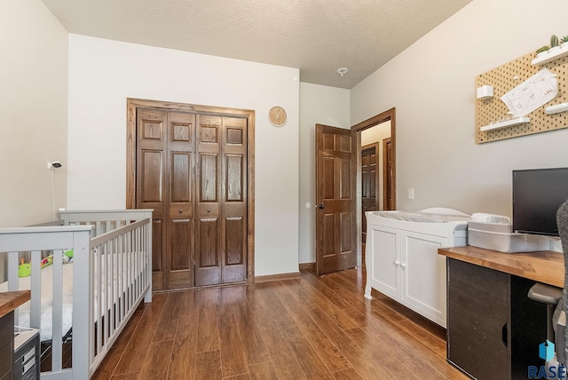 4005 S Grand Slam Ave, Sioux Falls, SD 57110 - bedroom with wood finished floors and baseboards