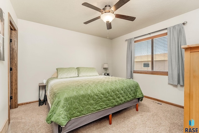4005 S Grand Slam Ave, Sioux Falls, SD 57110 - carpeted bedroom with baseboards and a ceiling fan