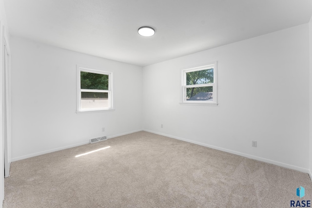 409 S 8th Ave, Brandon, SD 57005 - carpeted spare room featuring healthy amount of natural light