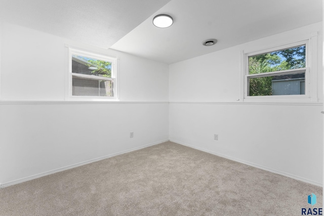 409 S 8th Ave, Brandon, SD 57005 - carpeted empty room featuring baseboards