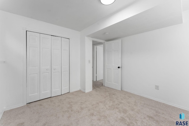 409 S 8th Ave, Brandon, SD 57005 - unfurnished bedroom featuring carpet and a closet