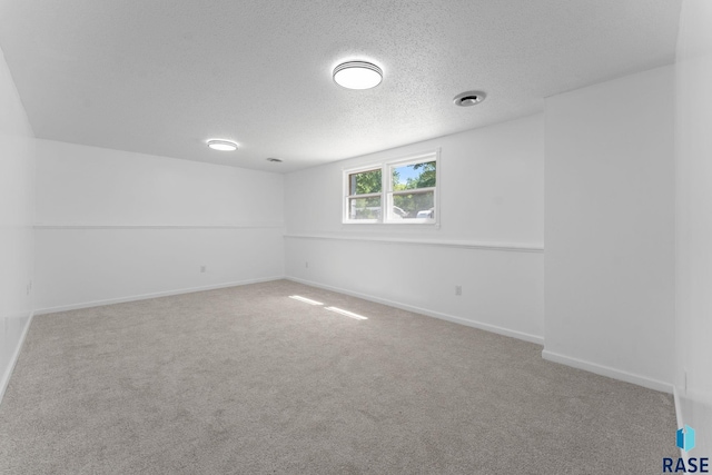 409 S 8th Ave, Brandon, SD 57005 - empty room featuring carpet floors and a textured ceiling