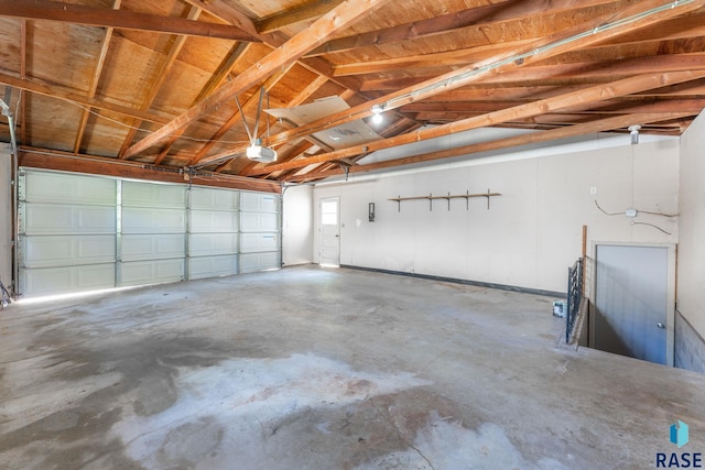 409 S 8th Ave, Brandon, SD 57005 - garage featuring a garage door opener