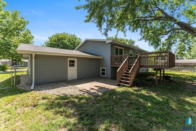 409 S 8th Ave, Brandon, SD 57005 - back of house featuring stairs, a deck, and a patio area