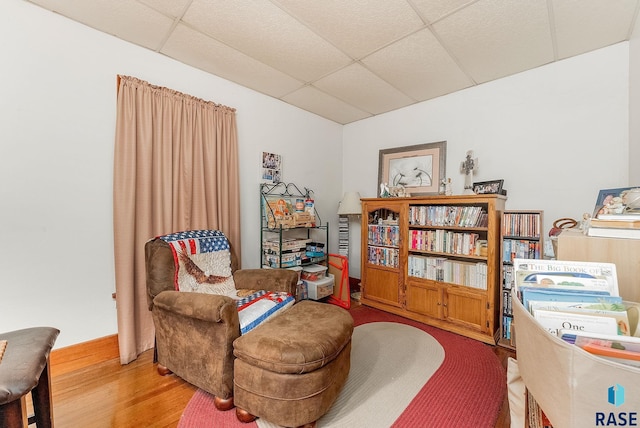 28437 462nd Ave, Davis, SD 57021 - living area with a paneled ceiling and wood finished floors