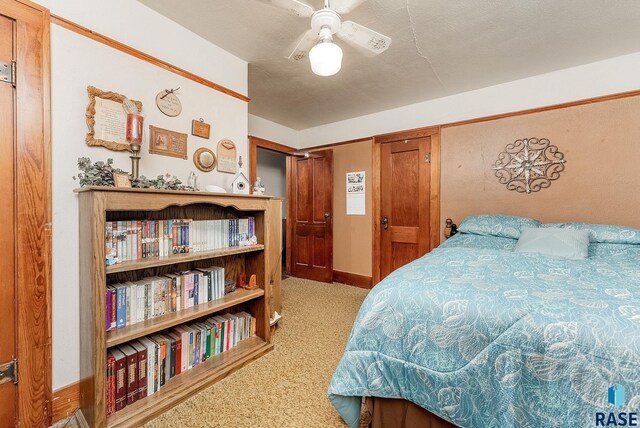 28437 462nd Ave, Davis, SD 57021 - carpeted bedroom featuring baseboards and a textured ceiling