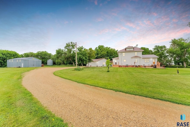28437 462nd Ave, Davis, SD 57021 - view of green lawn featuring an outbuilding and driveway