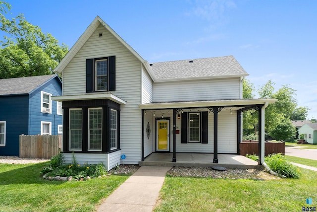 624 S 2nd Ave, Sioux Falls, SD 57104 - traditional-style house with covered porch and a shingled roof
