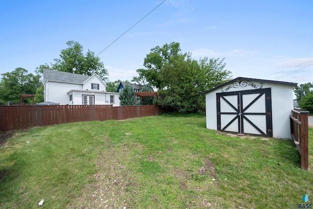 624 S 2nd Ave, Sioux Falls, SD 57104 - view of yard with a storage unit