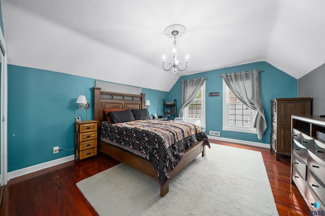 624 S 2nd Ave, Sioux Falls, SD 57104 - bedroom with wood finished floors, lofted ceiling, and a chandelier