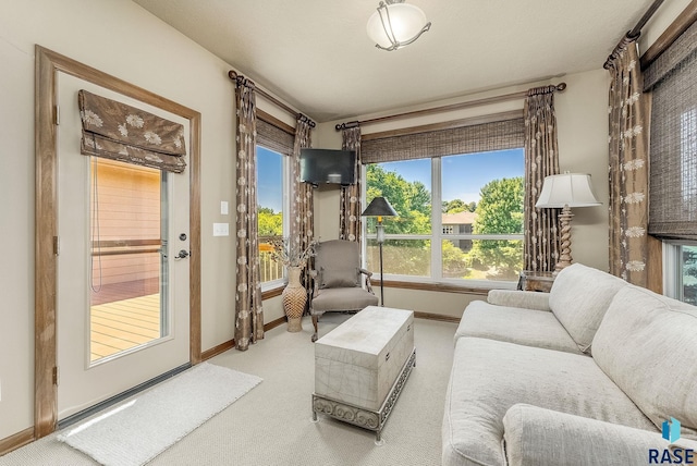 5809 S Nature Run Pl, Sioux Falls, SD 57108 - carpeted living area featuring baseboards