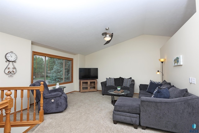 4400 E 38th St, Sioux Falls, SD 57103 - carpeted living room featuring lofted ceiling and baseboards