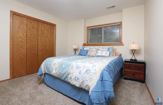 4400 E 38th St, Sioux Falls, SD 57103 - bedroom featuring light colored carpet and a closet