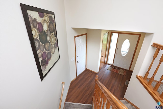 4400 E 38th St, Sioux Falls, SD 57103 - foyer entrance with dark wood finished floors and stairs