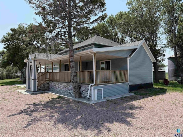 27139 US Highway 81, Freeman, SD 57319 - view of front facade featuring covered porch and a shingled roof