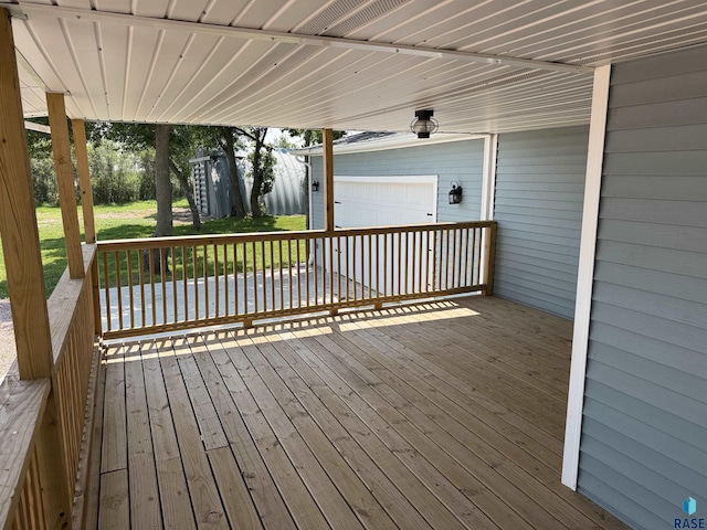 27139 US Highway 81, Freeman, SD 57319 - wooden terrace featuring a garage