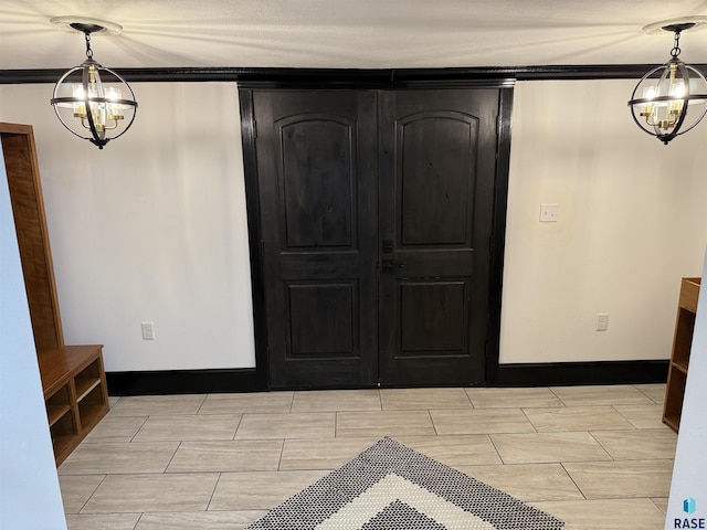 27139 US Highway 81, Freeman, SD 57319 - foyer with a chandelier and ornamental molding