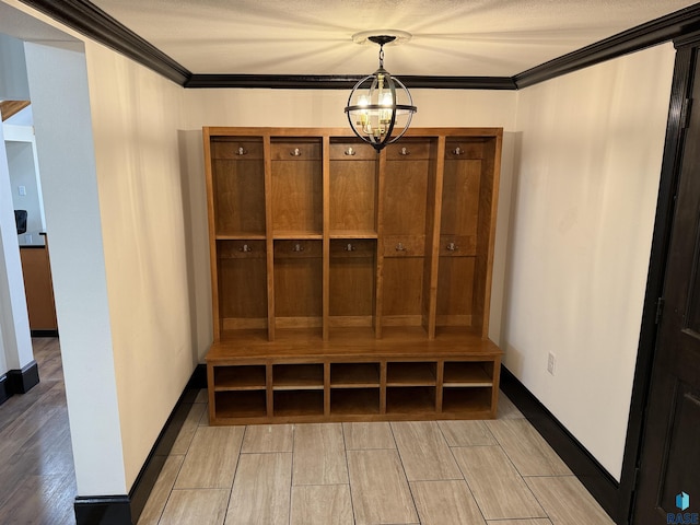 27139 US Highway 81, Freeman, SD 57319 - mudroom featuring light wood-type flooring, crown molding, and a chandelier