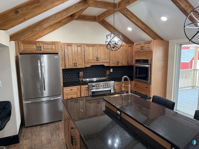 27139 US Highway 81, Freeman, SD 57319 - kitchen with appliances with stainless steel finishes, backsplash, beam ceiling, dark stone counters, and dark wood-style floors