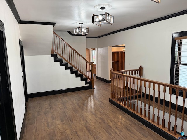 27139 US Highway 81, Freeman, SD 57319 - stairs featuring ornamental molding, wood finished floors, and a chandelier
