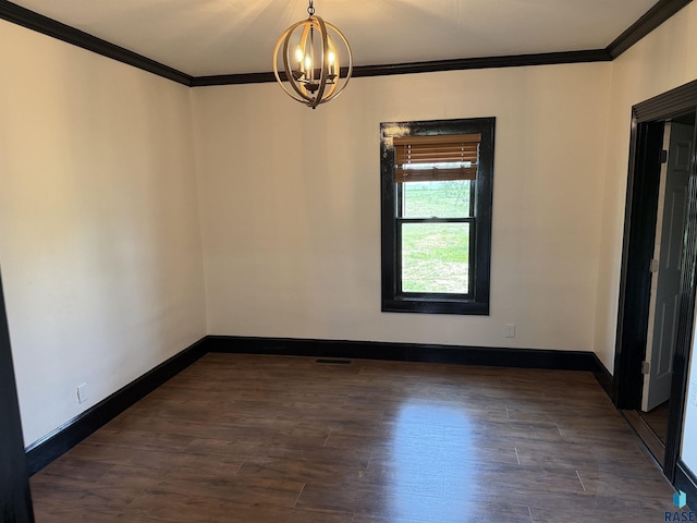27139 US Highway 81, Freeman, SD 57319 - spare room featuring ornamental molding, a chandelier, and dark wood-type flooring