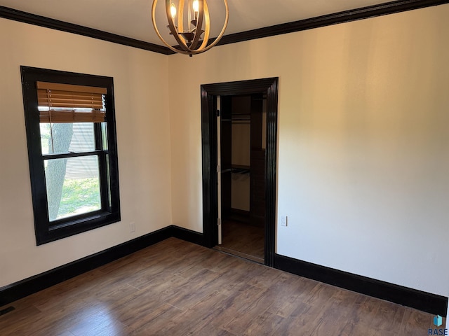 27139 US Highway 81, Freeman, SD 57319 - unfurnished room with crown molding, a chandelier, and dark wood finished floors