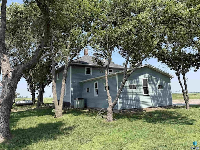 27139 US Highway 81, Freeman, SD 57319 - back of property featuring a lawn and a chimney