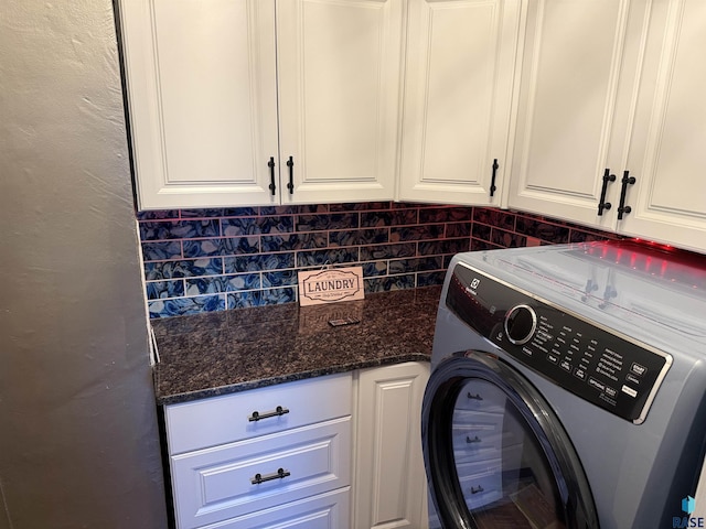 27139 US Highway 81, Freeman, SD 57319 - washroom with washer / dryer and cabinet space