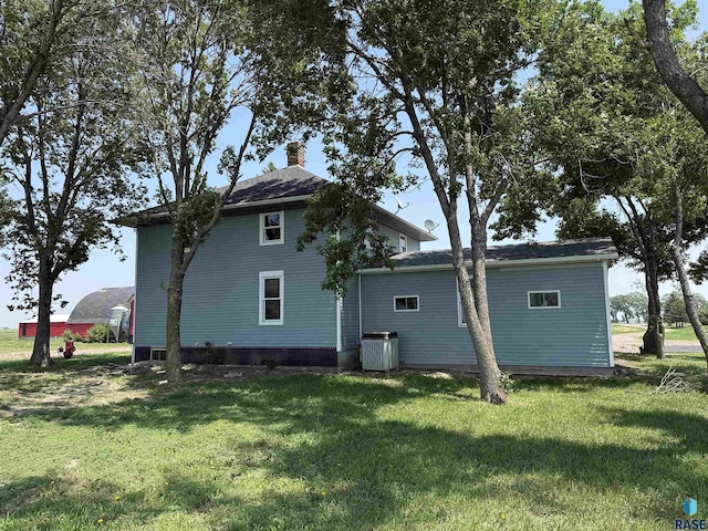 27139 US Highway 81, Freeman, SD 57319 - back of house with a chimney and a yard